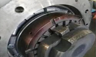 Failure Analysis of Backup Roll’s Locating Bearing of 1250 Cold-rolling Mill 